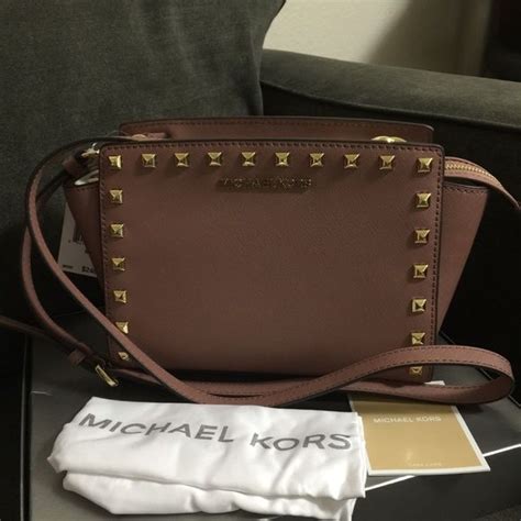 michael kors selma stud medium messenger dusty rose
